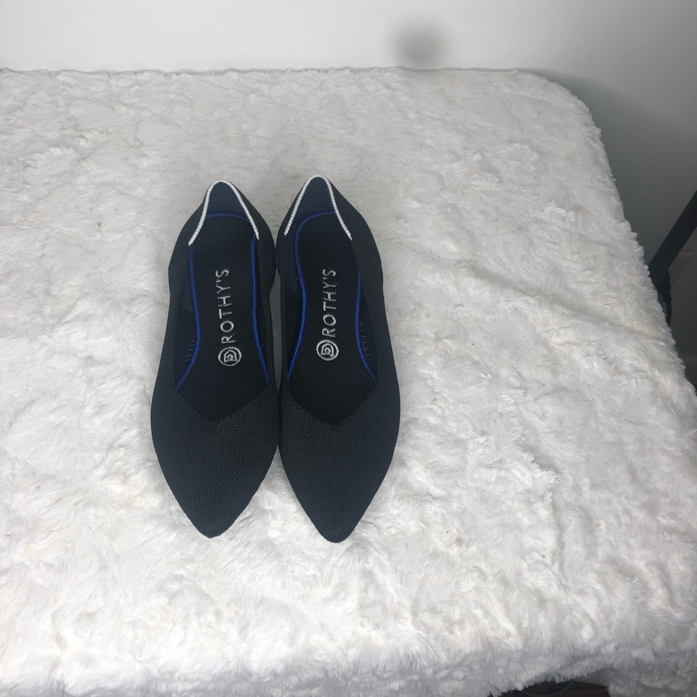 Rothy’s Black Pointy toe flats shoes.